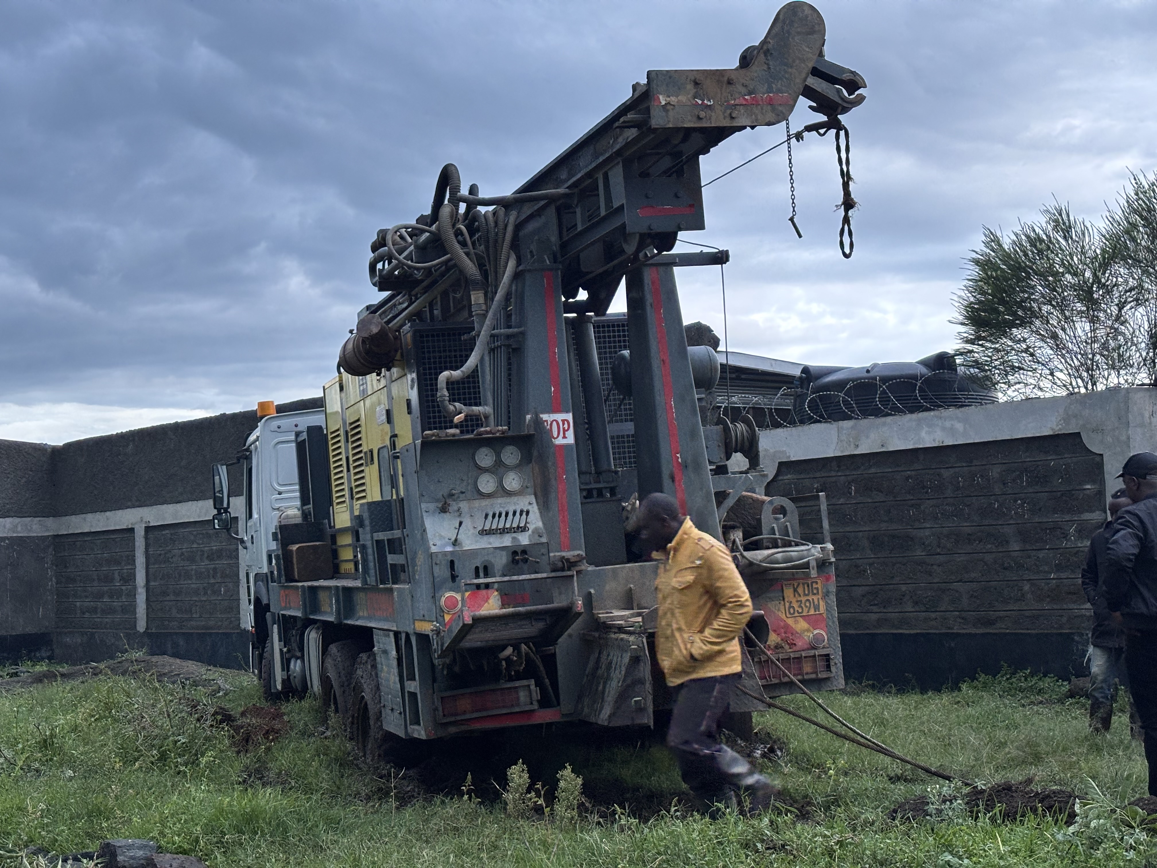 Drilling rig stuck in black cotton soil at Miti Mingi site entry, Nakuru County